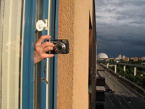 globen och kamerahanden